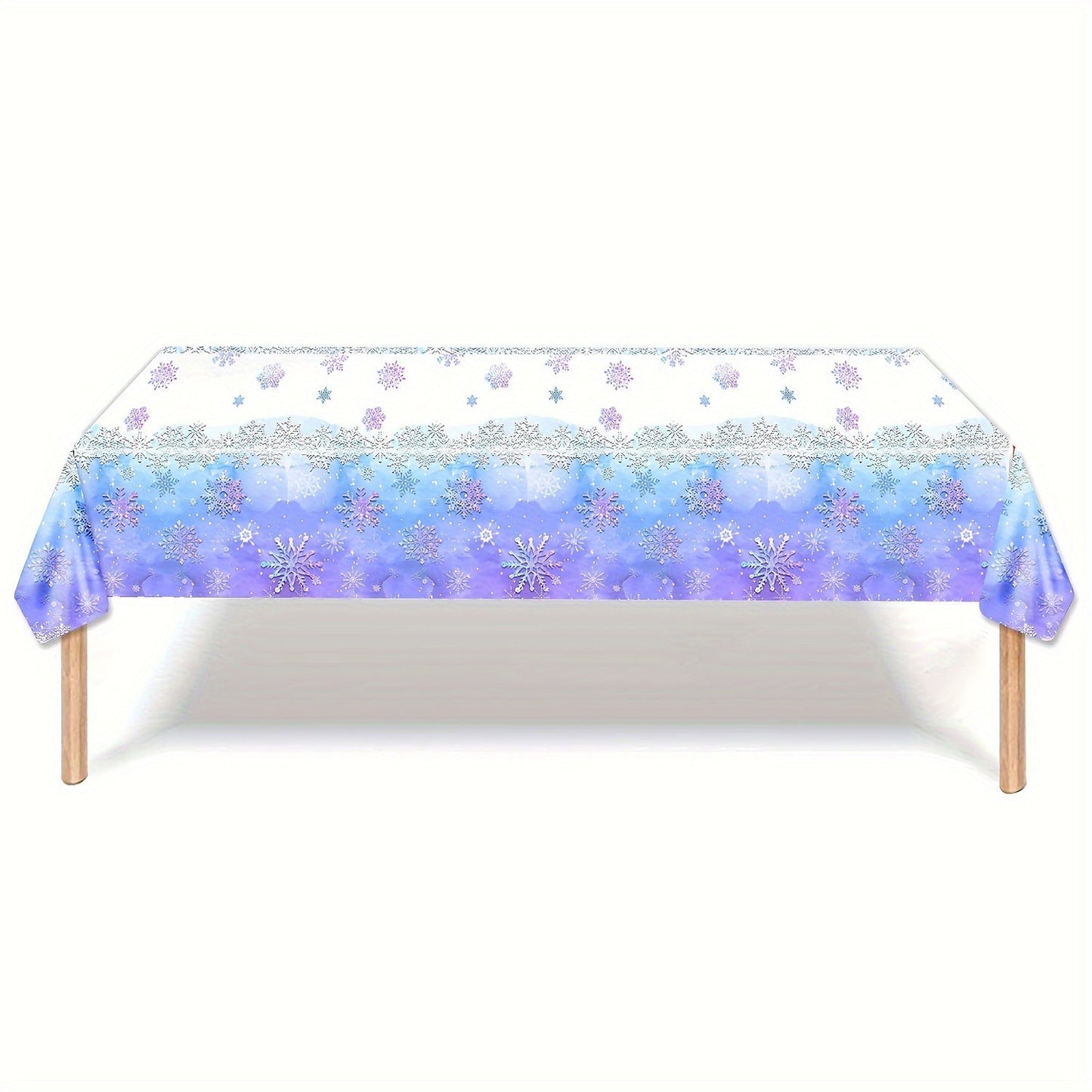 Blue and purple snowflake tablecloth that is ideal for hosting dinosaur birthday parties. Made from durable plastic material, this rectangular tablecloth measures 107.95x179.83 cm in size. Ideal for adding a festive touch to your party decor.