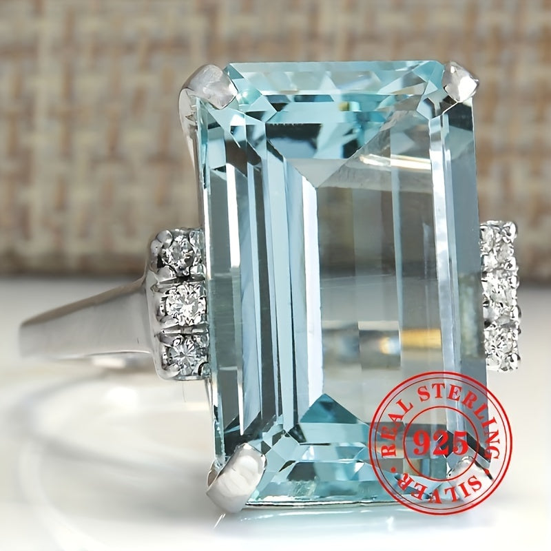 Simple yet elegant, this classic 1 Lady Anniversary Ring features a 5.4g S925 Sterling Silver band with a 4 prong-set square Aquamarine synthetic gemstone. Perfect for everyday casual wear or special occasions like weddings, banquets, and parties, this