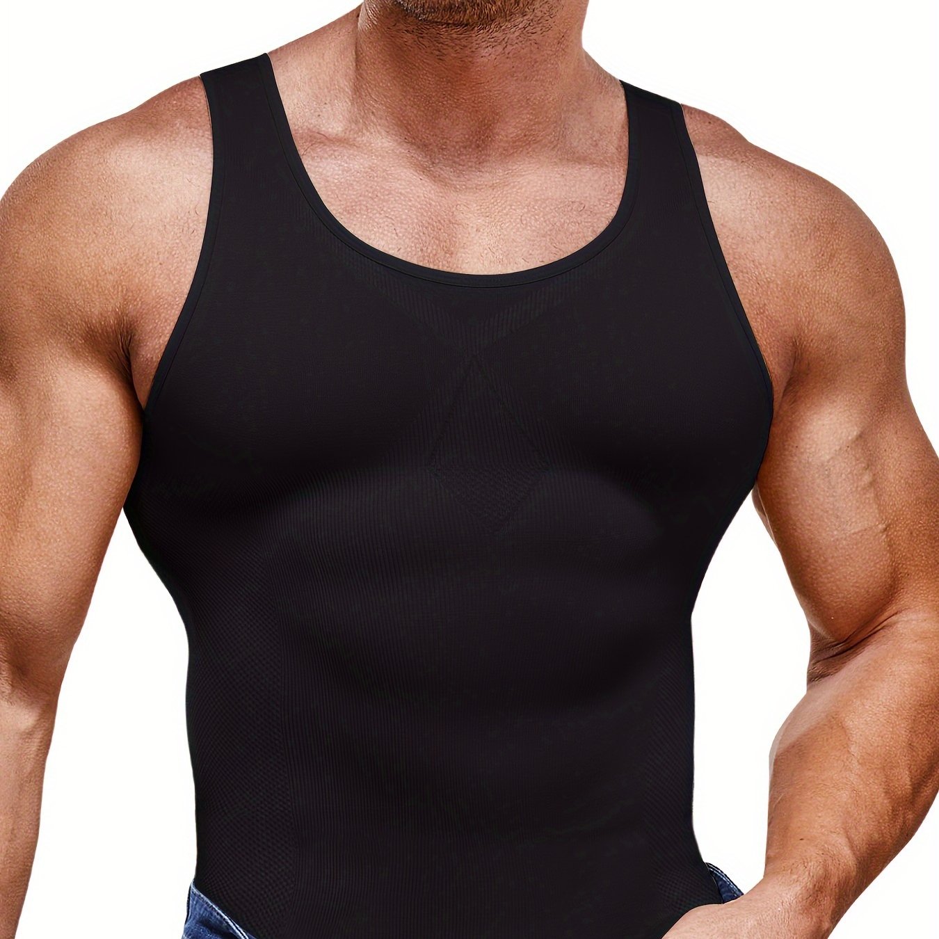 Men's sleeveless compression shirt shapes the body, controls tummy, and strengthens waist during workouts.