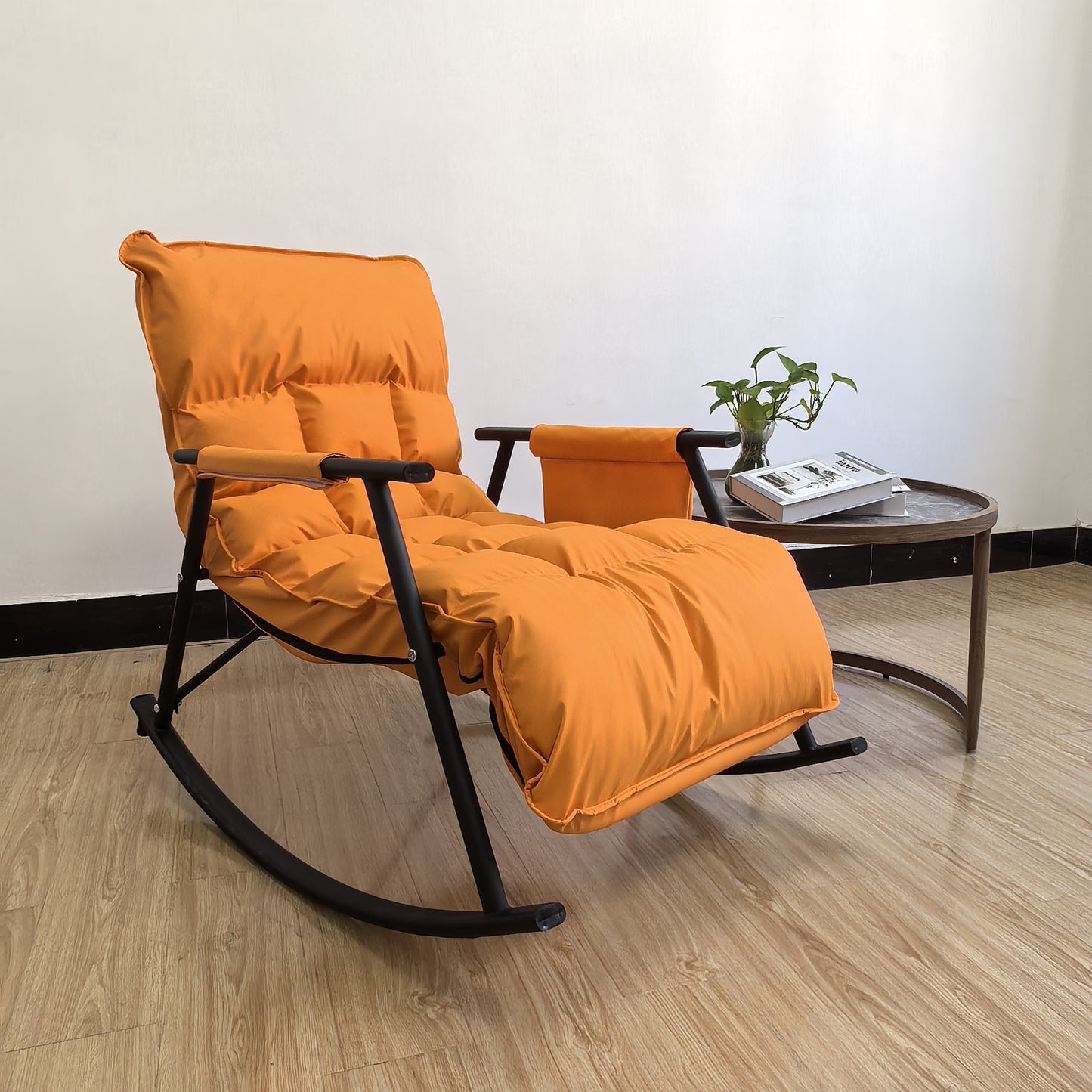 Adjustable recliner rocking chair with backrest, metal frame, detachable design, cotton fabric, luxurious orange leisure lounger for different room types.