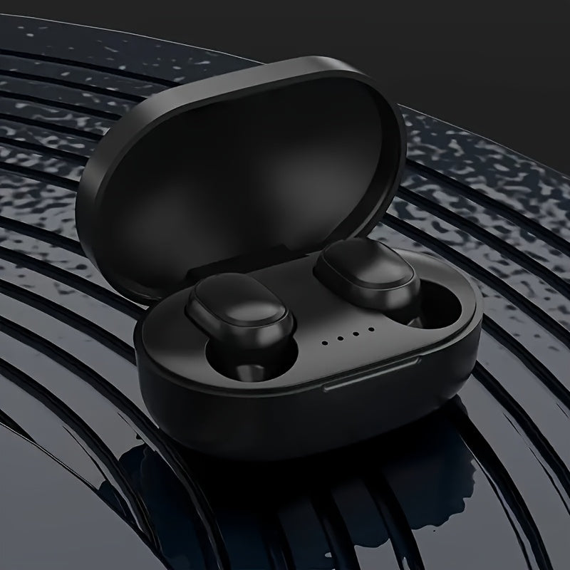 Compact and portable wireless headphones with transparent space capsule design and battery level display.