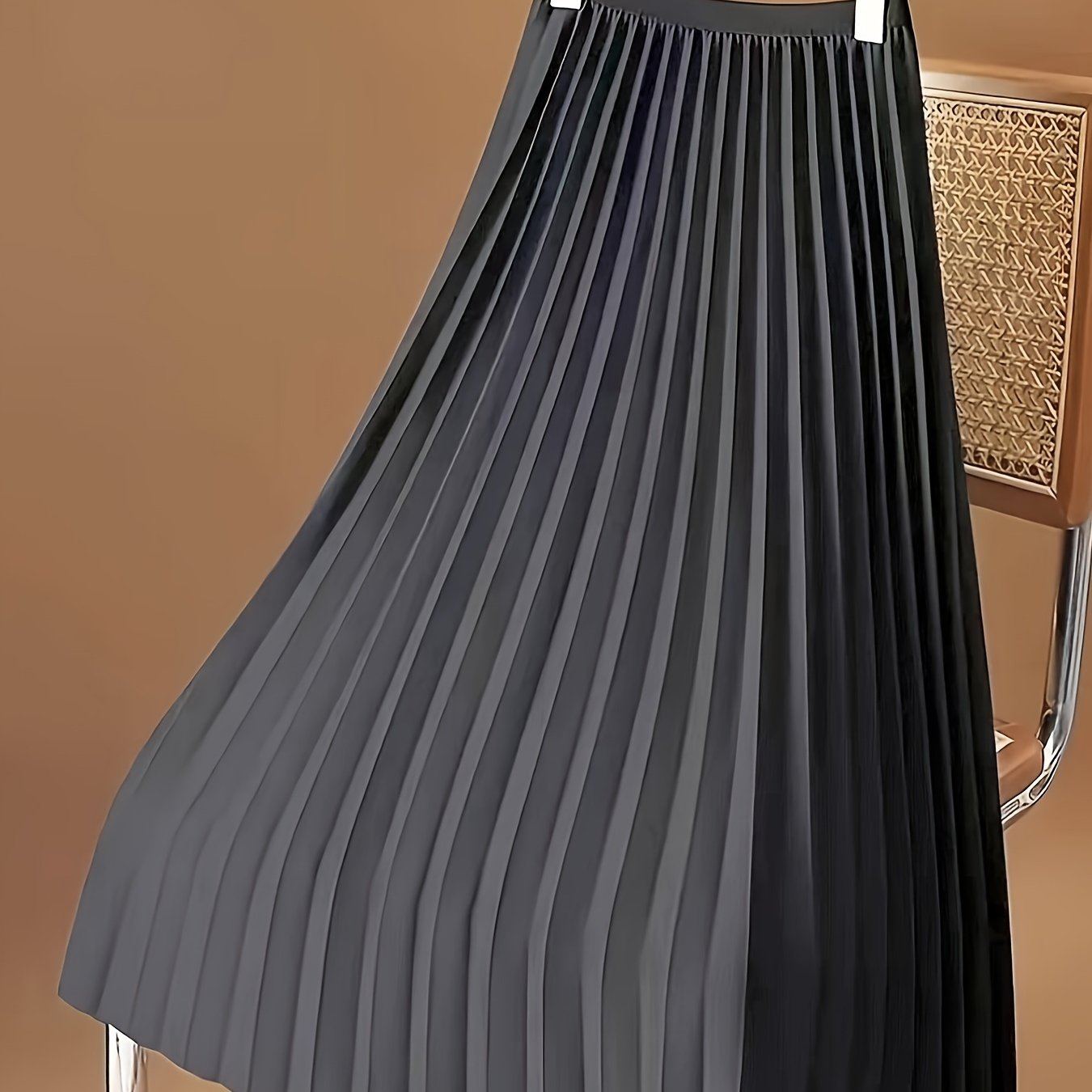 Stylish pleated midi skirt for spring and summer, women's fashion.