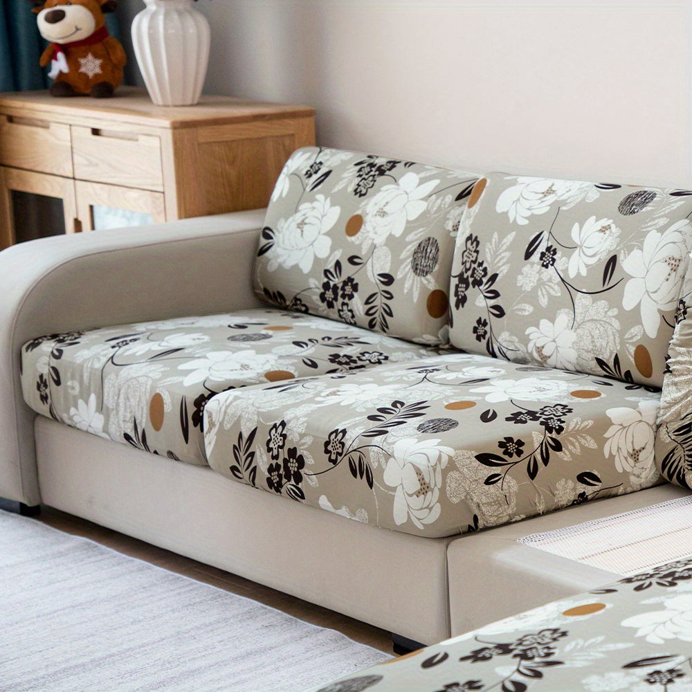 Waterproof flower printed sofa slipcover for furniture protection in various settings.