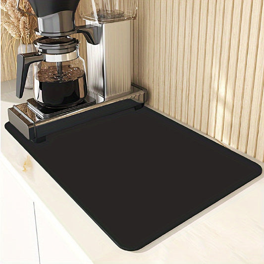 Single pack of a versatile coffee machine pad in a simple solid color design, made of diatom mud and covered in 100% polyester for absorbency and softness. Non-slip and easy to clean, it serves as a countertop protector for both kitchen and bathroom use.