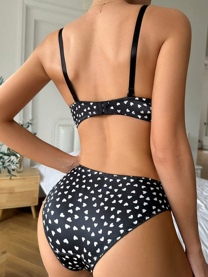 Stylish black bikini set with polka dots and heart print - Sexy and comfortable lingerie for women made of polyester blend.