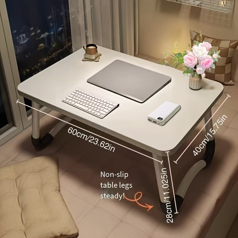 Portable folding laptop desk with nonslip legs, compact for home and dorm use, sturdy wooden stand with rounded corners.