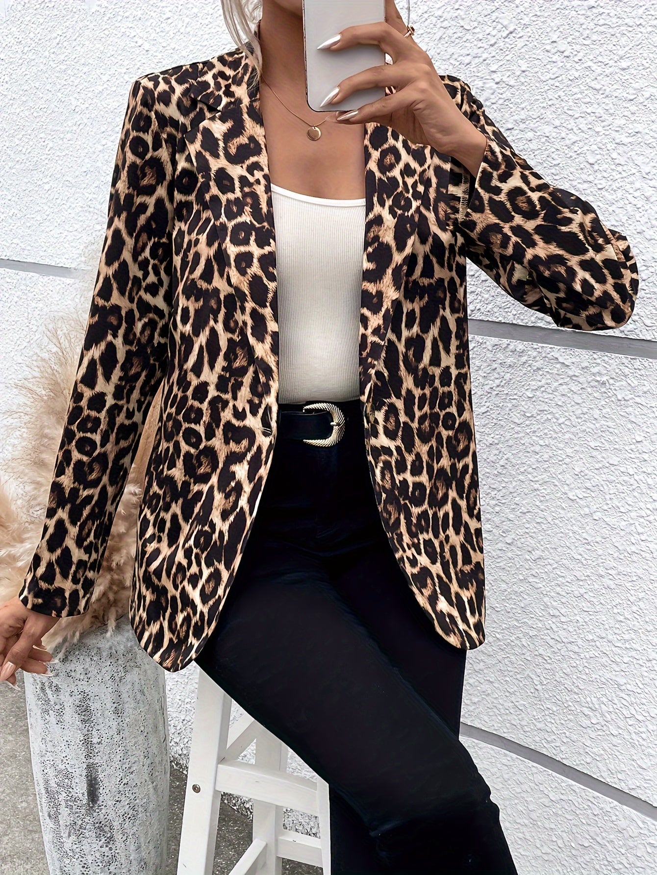 Stylish leopard print blazer for women with long sleeves, lapel collar, and button front. Suitable for both office and casual wear.