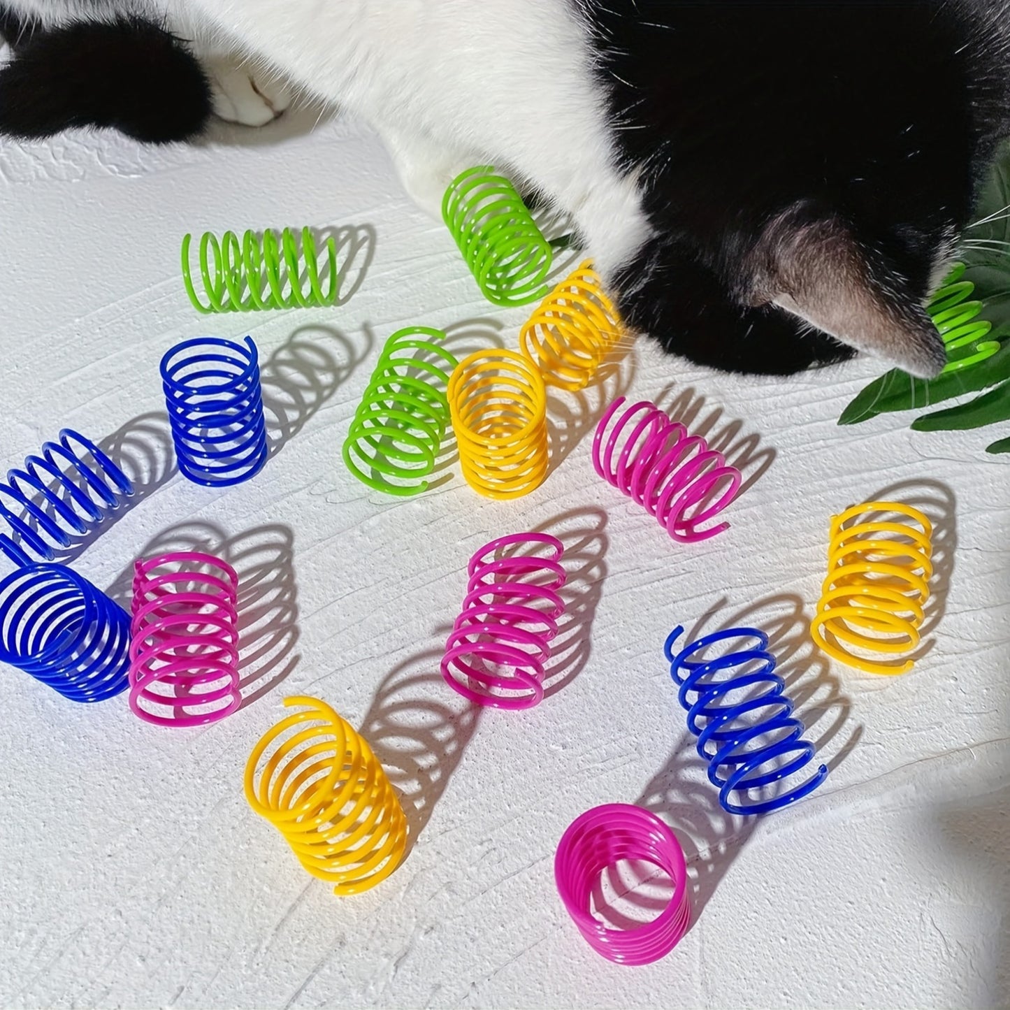 100-Pack Cat Spring Toys - Plastic coil springs for interactive play, teeth cleaning, and exercise. No batteries required.