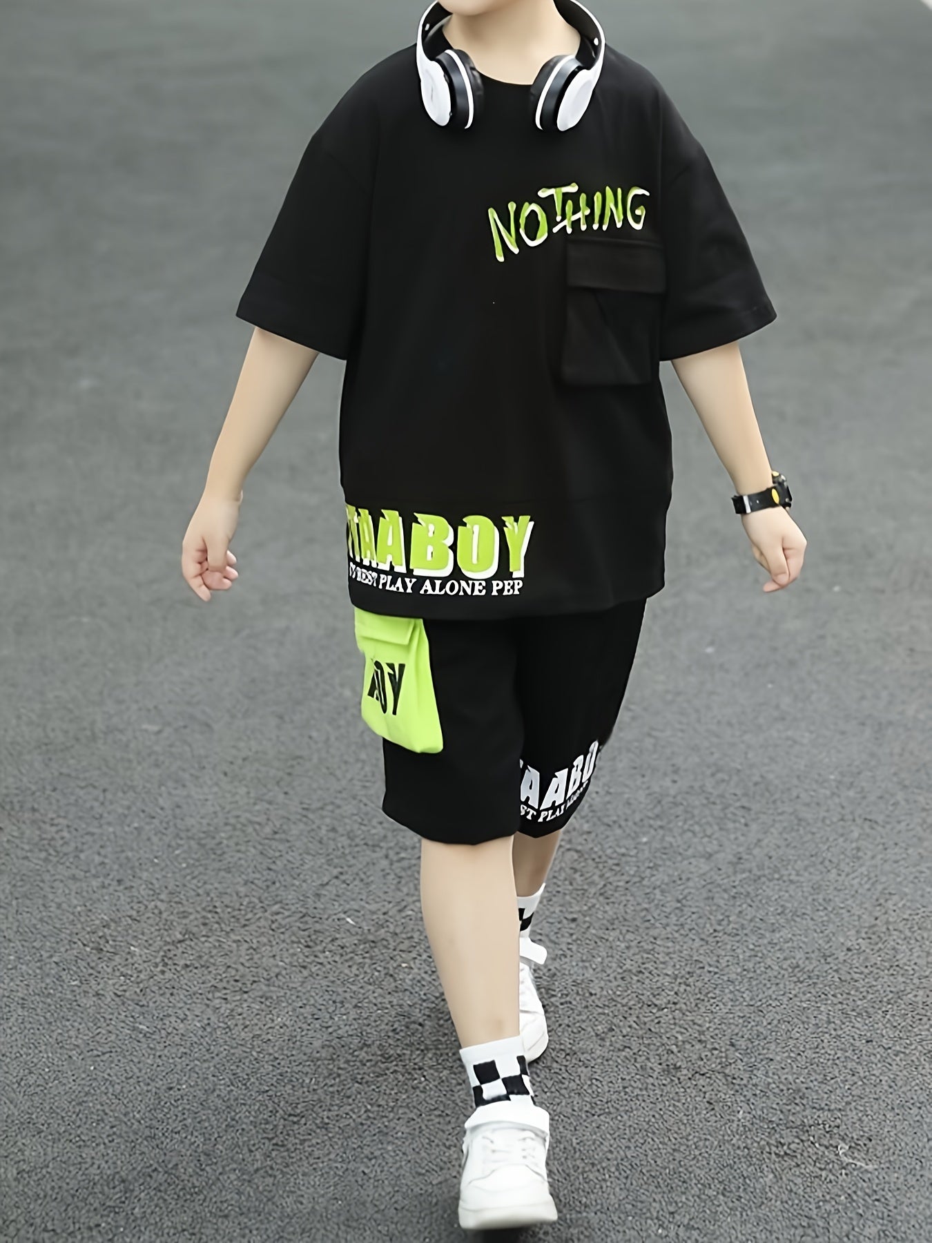 Boys' summer sports outfit with cartoon design, includes top and shorts set for older kids, perfect for outdoor activities.