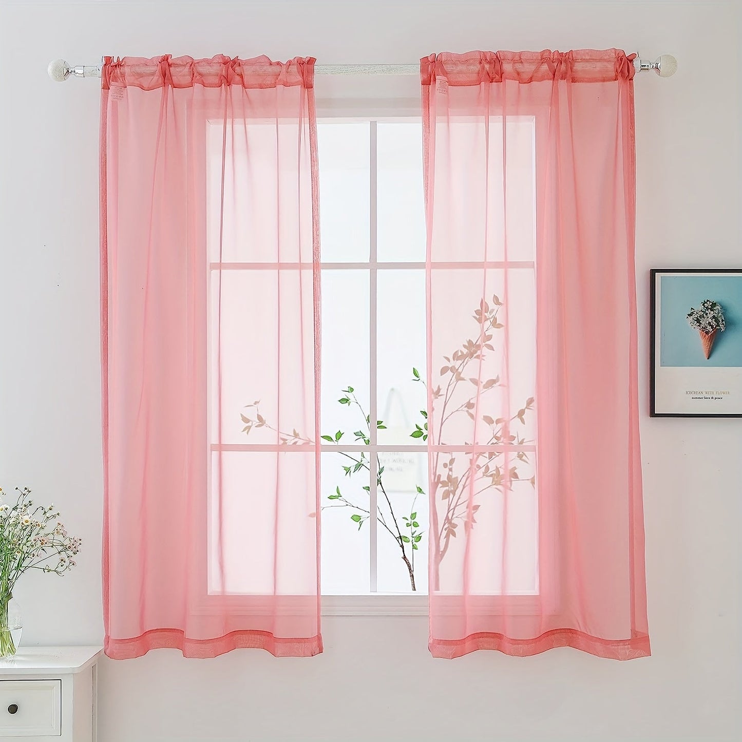 Two panels of sheer curtains with a basic rod pocket design, perfect for adding a touch of elegance to your bedroom, office, living room, yard, kitchen, or any other space in your home.