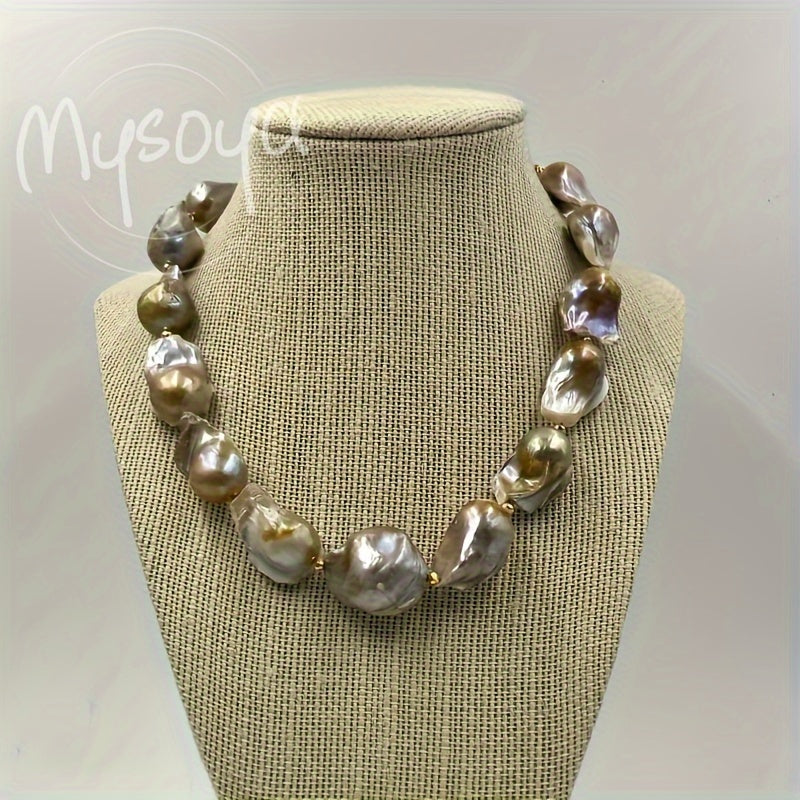 Handcrafted MYSOYA Baroque Pearl Necklace featuring 100% natural freshwater pearls ranging from 21-28mm. This elegant and luxurious jewelry piece is perfect for everyday wear, weddings, and special occasions. Makes a stunning Valentine's Day gift or June