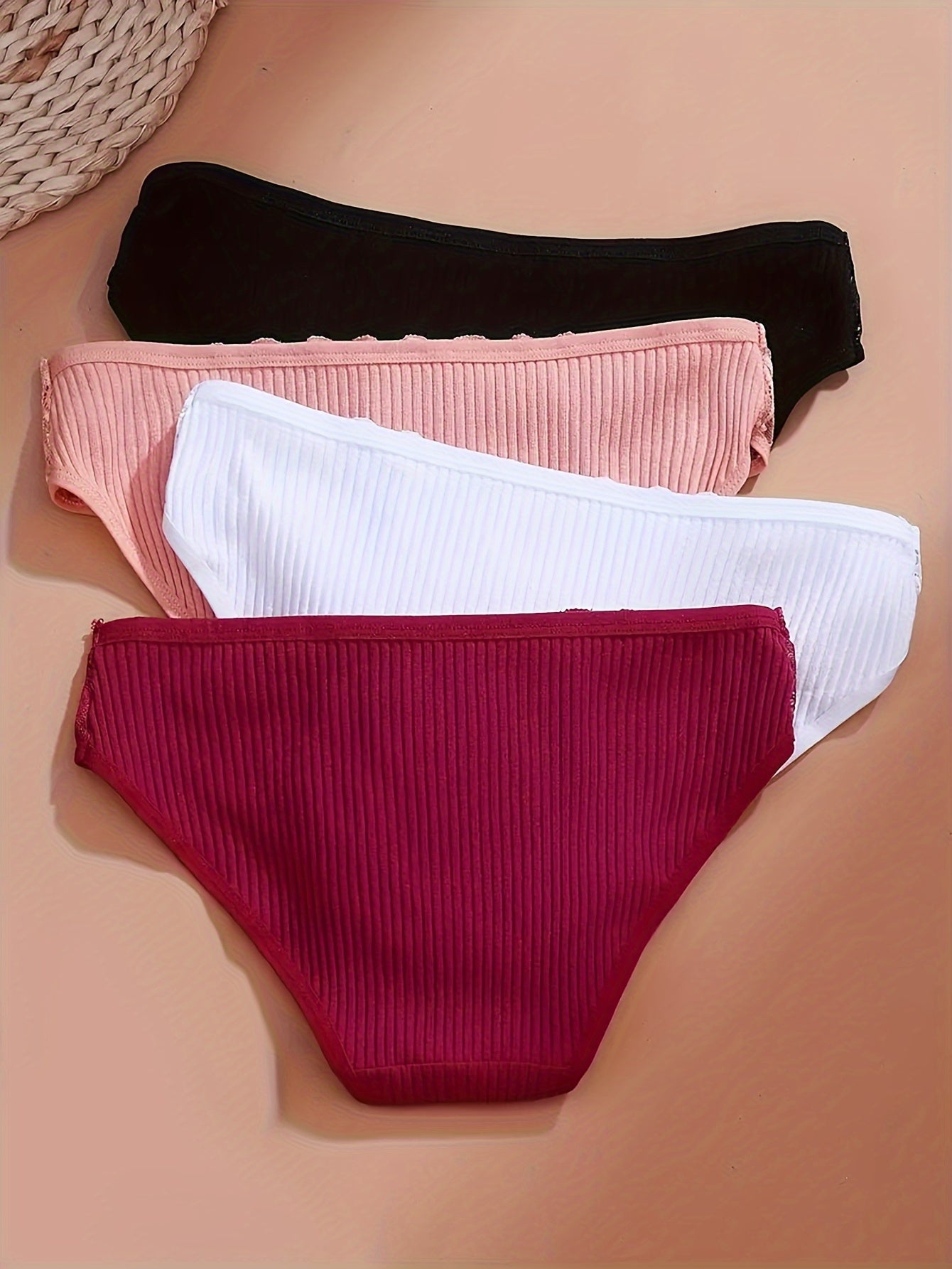 4-pack of lace trim briefs for women, made of comfortable breathable cotton.