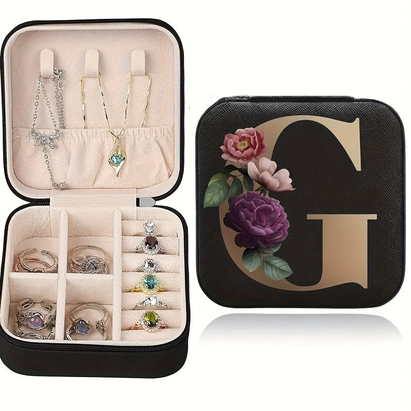 Floral initial jewelry organizer box with compact design, soft velvet lining, durable zipper, and lightweight, ideal for jewelry organization and travel.