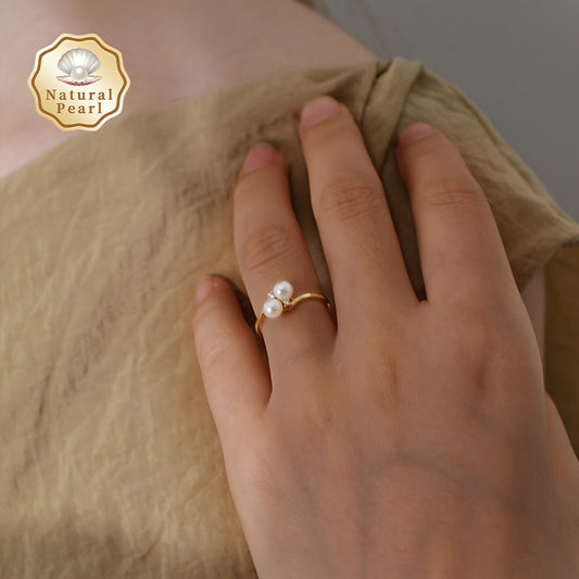 This elegant and unique pearl ring is the perfect accessory for women. It features two 6-7mm natural freshwater pearls on an open ring design, making it a fashionable and personalized piece. Ideal for weddings or as a special gift, this ring comes