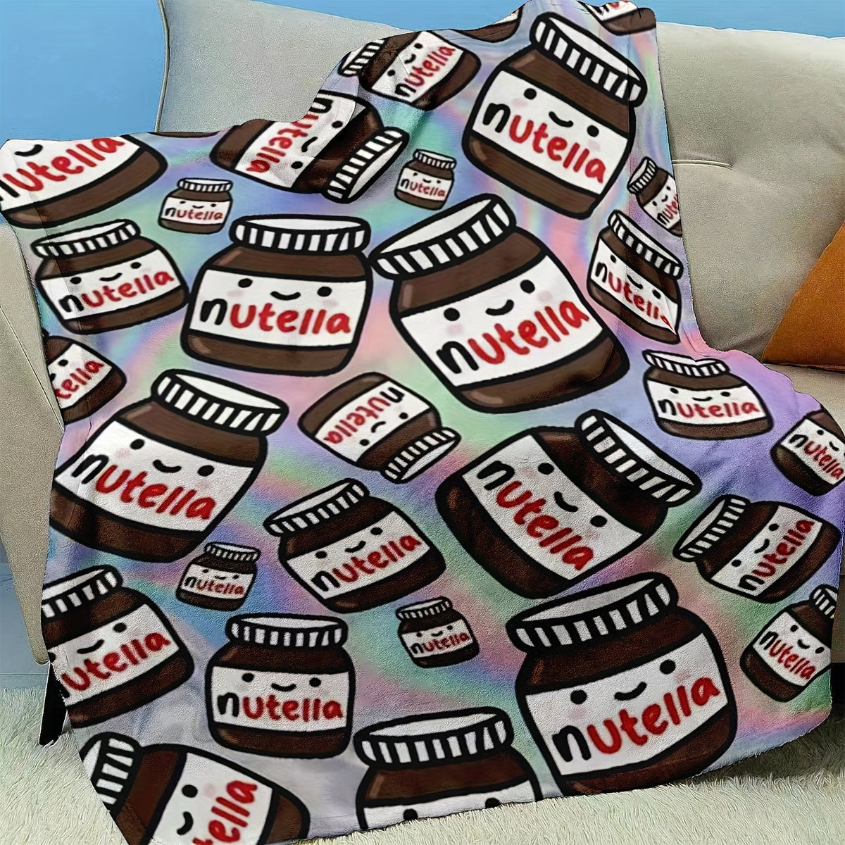 Soft and warm Nutella-themed flannel throw blanket featuring a contemporary design. This all-purpose blanket is perfect for any season and can be used at home, in the office, during fitness activities, while traveling, camping, on the couch, chair, or