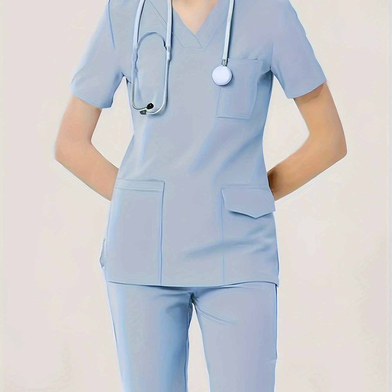 Women's two-piece healthcare uniform with a V-neck top, stretchy fabric, dental scrub gloves, functional pockets, and comfortable fit.