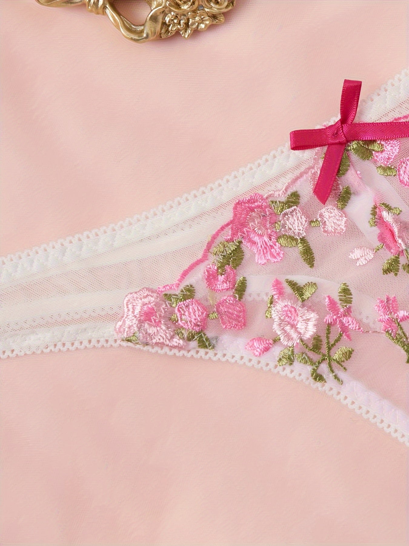 Floral thongs, mesh panties, and sexy lingerie for women.