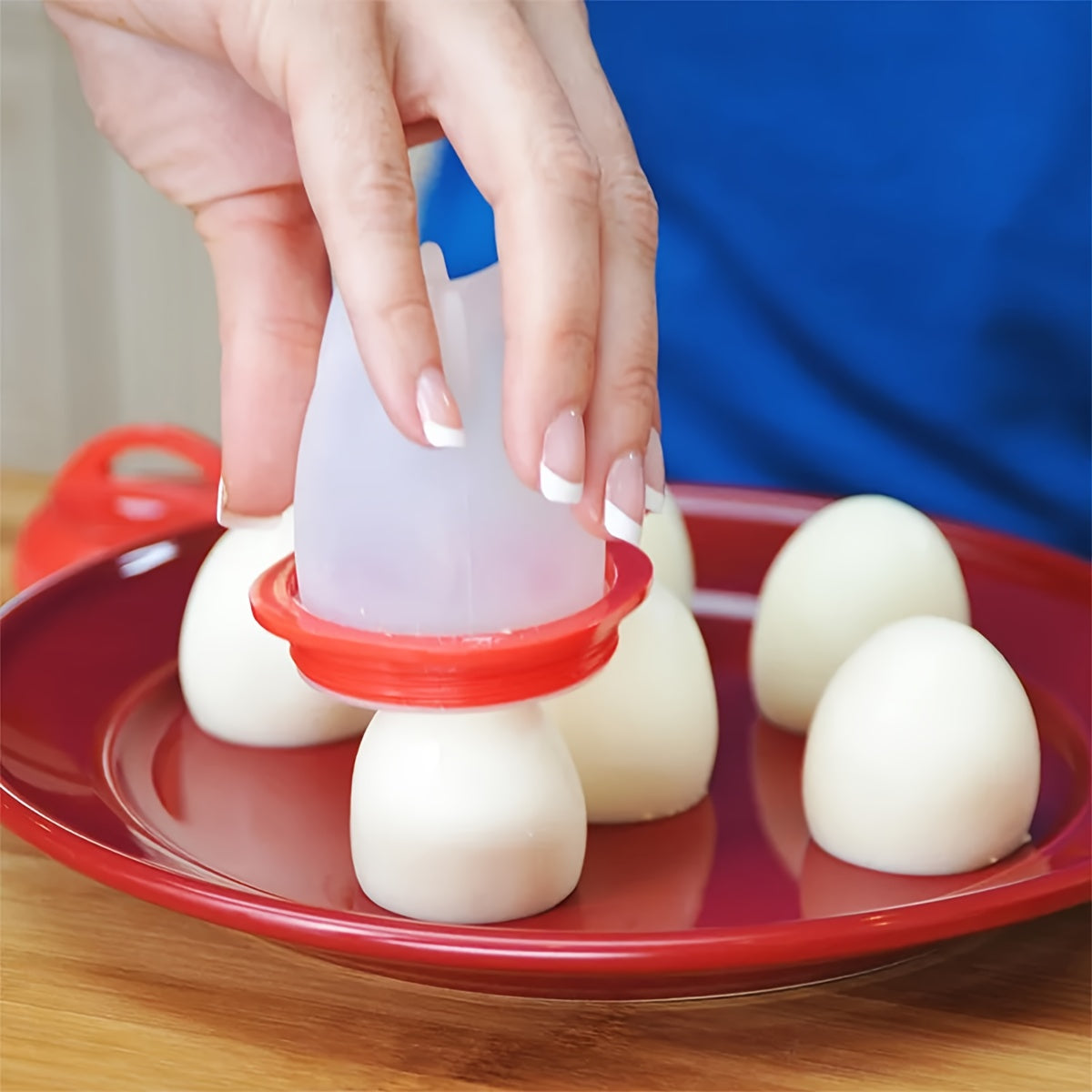 Easily cook perfectly poached eggs with our high-temperature resistant silicone egg poachers, featuring a non-stick surface for easy shell removal.