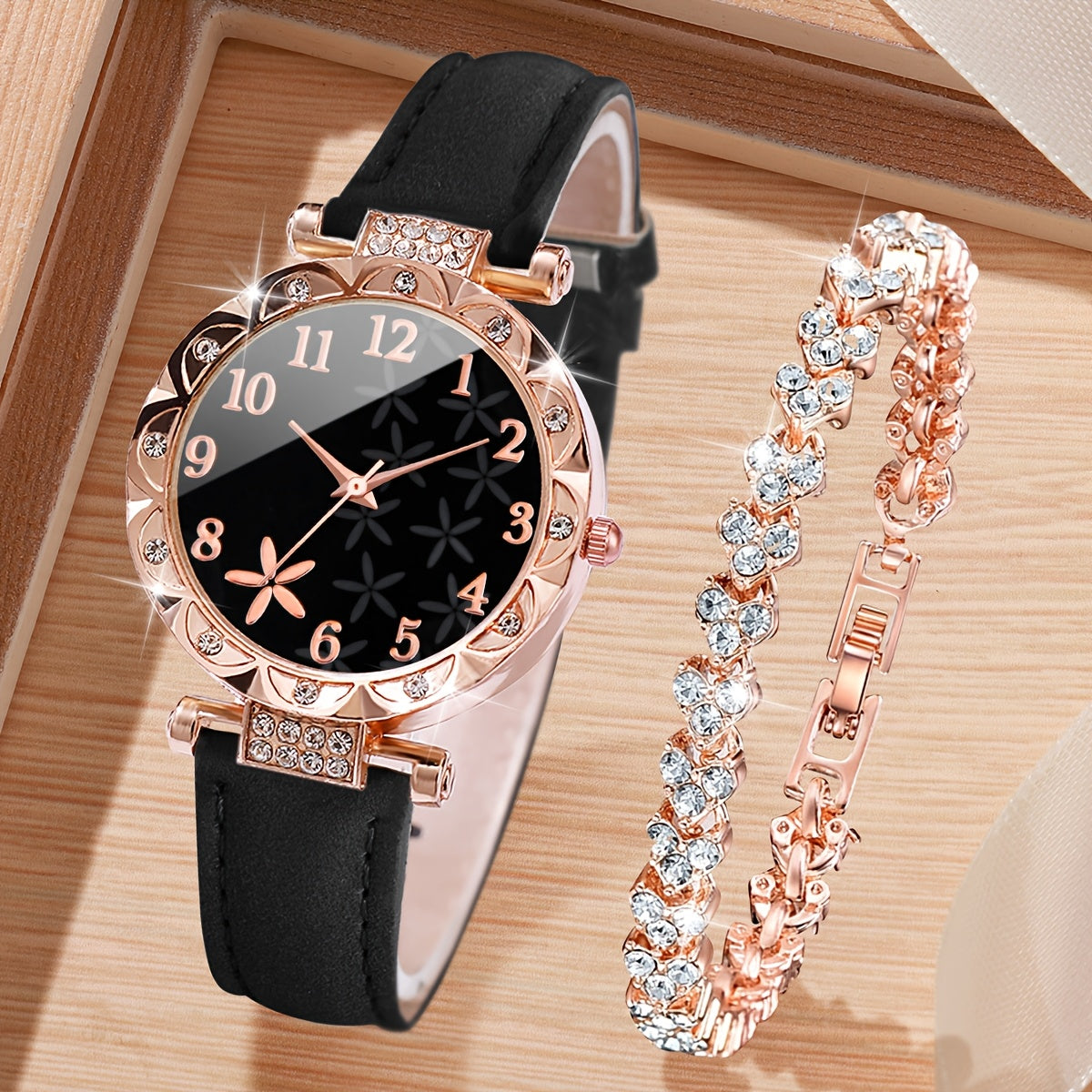 Set includes a women's fashion watch with bracelet. Features digital quartz movement, round alloy case, PU leather strap, and non-rechargeable battery. Watch box not included.