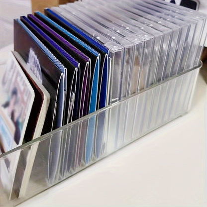 The Clear Acrylic CD/DVD Storage Basket is a sturdy and stylish solution for storing your media collection. This space-saving display rack can hold up to 20 standard cases, making it perfect for organizing your albums and games. Its durable construction