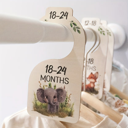 8 wooden closet dividers featuring cute animal themes for organizing clothes in a wardrobe for 24 months.