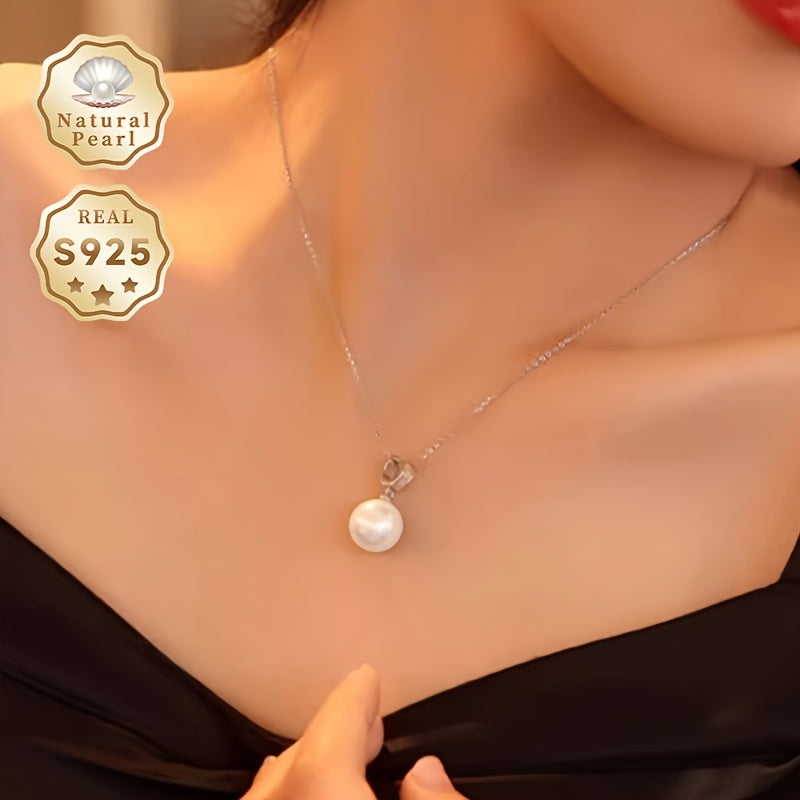 Surprise your loved one with this must-have gift - a stunning Pearl Necklace! This beautiful pendant necklace is made with S925 silver and features a 12-13mm round natural freshwater pearl. Each necklace is unique as natural pearls come in varying shapes