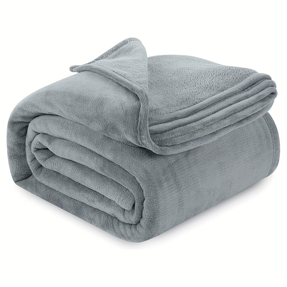 Solid grey throw blanket with a vintage style, featuring a 40 stick count. Perfect for all seasons and stain resistant, this knit fabric blanket is designed with a plain weave and movie theme. Made with anti-static microfiber fleece, this lightweight