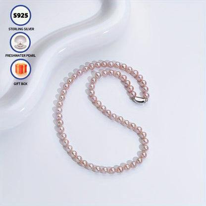 This stunning necklace features 6-7mm pink and purple freshwater cultured pearls. The near-round shape of the pearls adds an elegant touch, while the AAAA+ high luster ensures a dazzling finish. Despite minor flaws, these pearls exude a dainty and