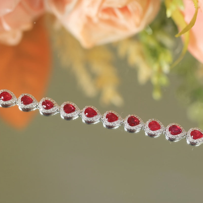 Stylish Sterling Silver Bracelet with Synthetic Red Gemstones and Celestial Theme, featuring zirconia Mosaic. This 925 Silver Plated Jewelry makes a perfect gift for December birthdays, special occasions, or Valentine's Day. A versatile fashion accessory