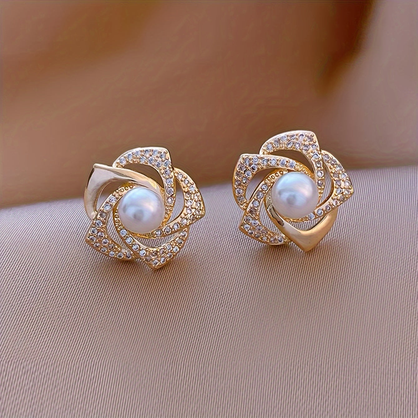 Set of 5 pairs of elegant French-inspired retro light luxury earrings with imitation pearl, ice crack pattern, wind flower, and flame designs.