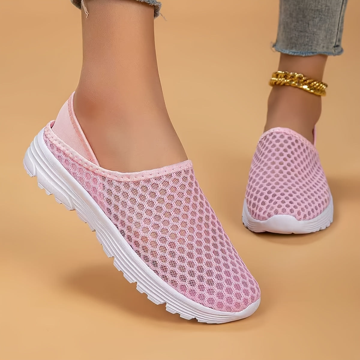 Mesh slip-on walking shoes with stability support, lightweight white summer footwear.