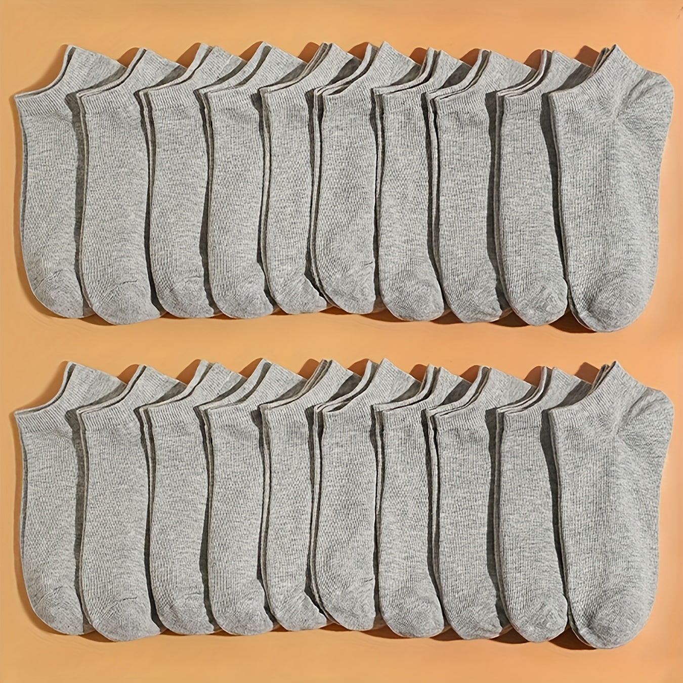 20 breathable ankle socks in versatile solid colors. Made of polyester blend, machine washable, and suitable for all seasons. Cute and comfortable.