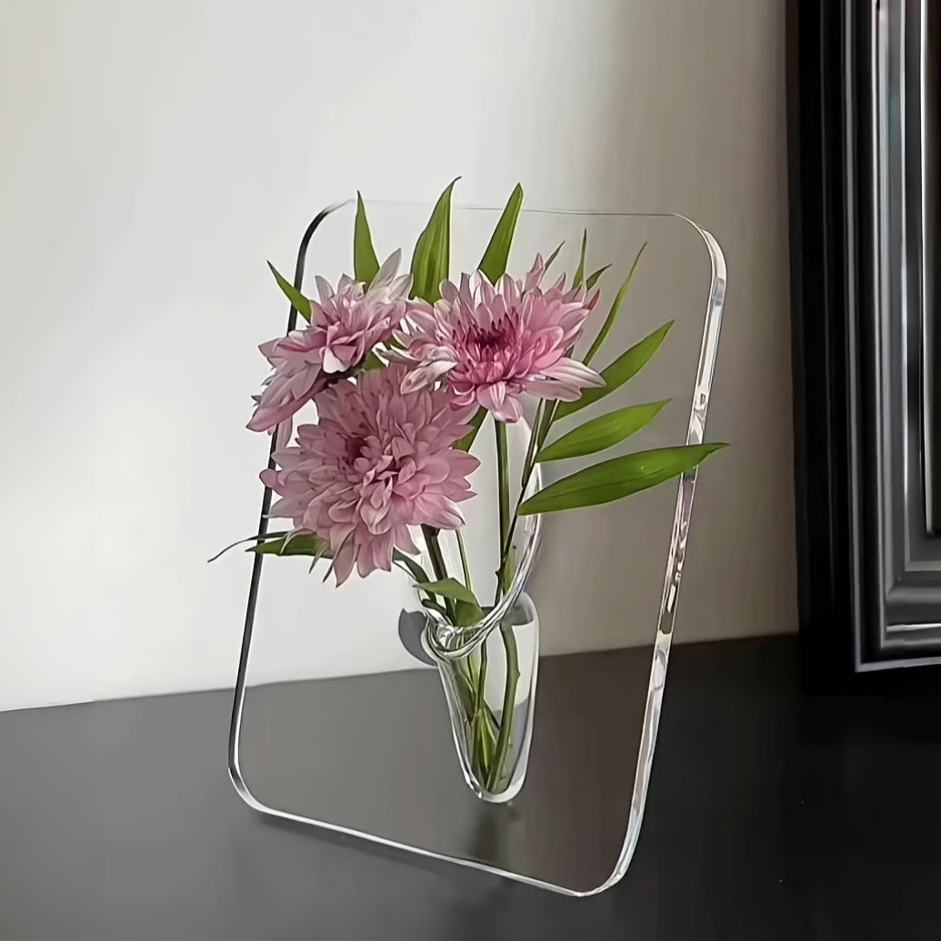 Art Deco-style acrylic resin bud vase with geometric transparent oblong design. Doubles as a creative picture frame. Ideal for home or office décor. Makes a great small gift (flowers not included).