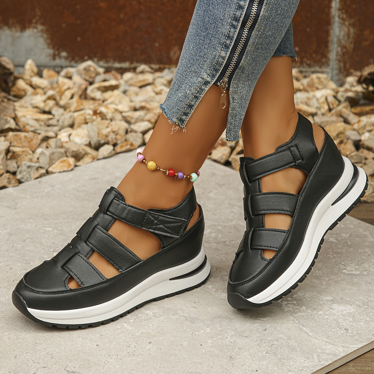 Soft sole platform sandals with round toe, comfortable for casual walking. Hollow wedge design for breathability.