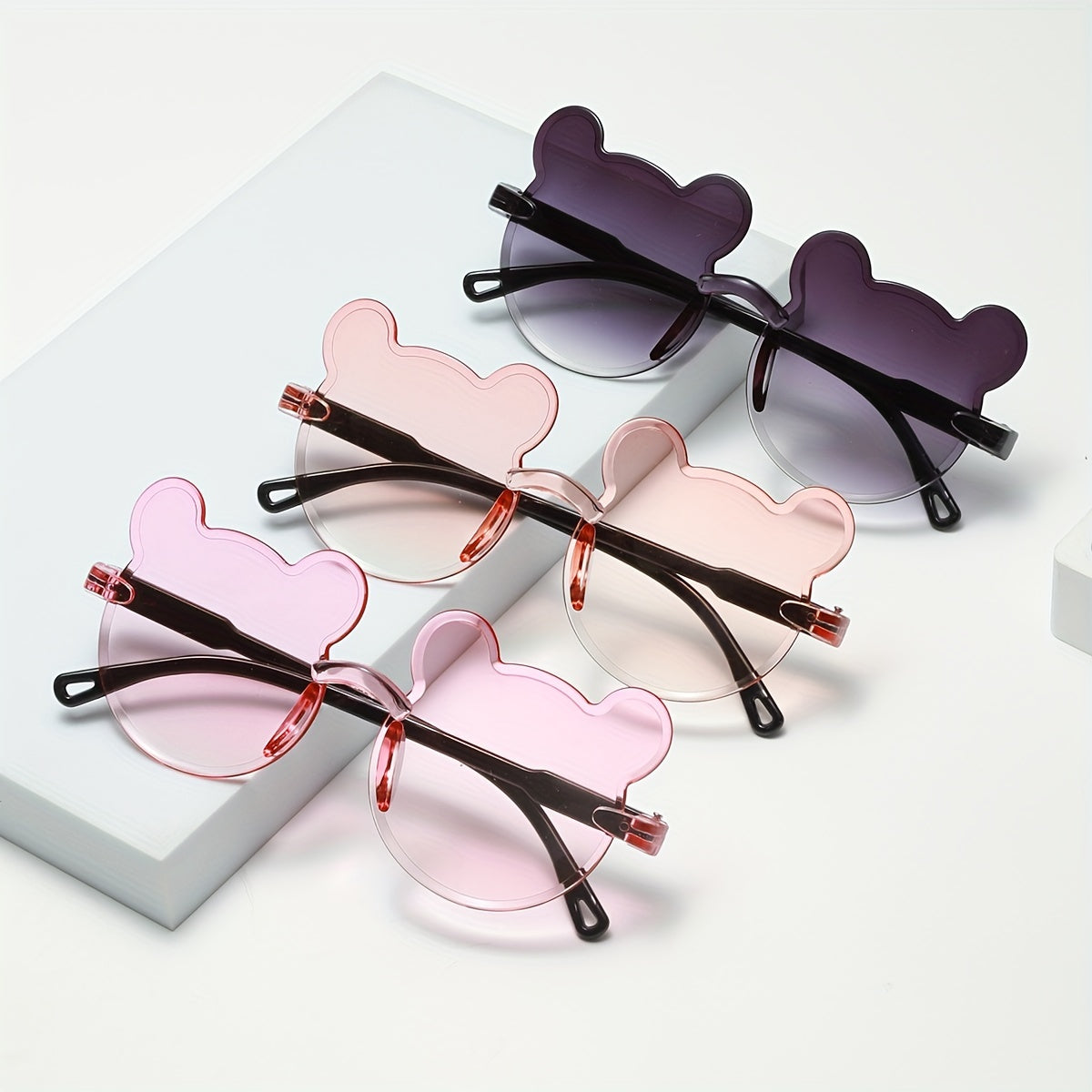 New bear decorative glasses set includes 3 pieces with a cartoon frameless design and bear-style gradient lenses.