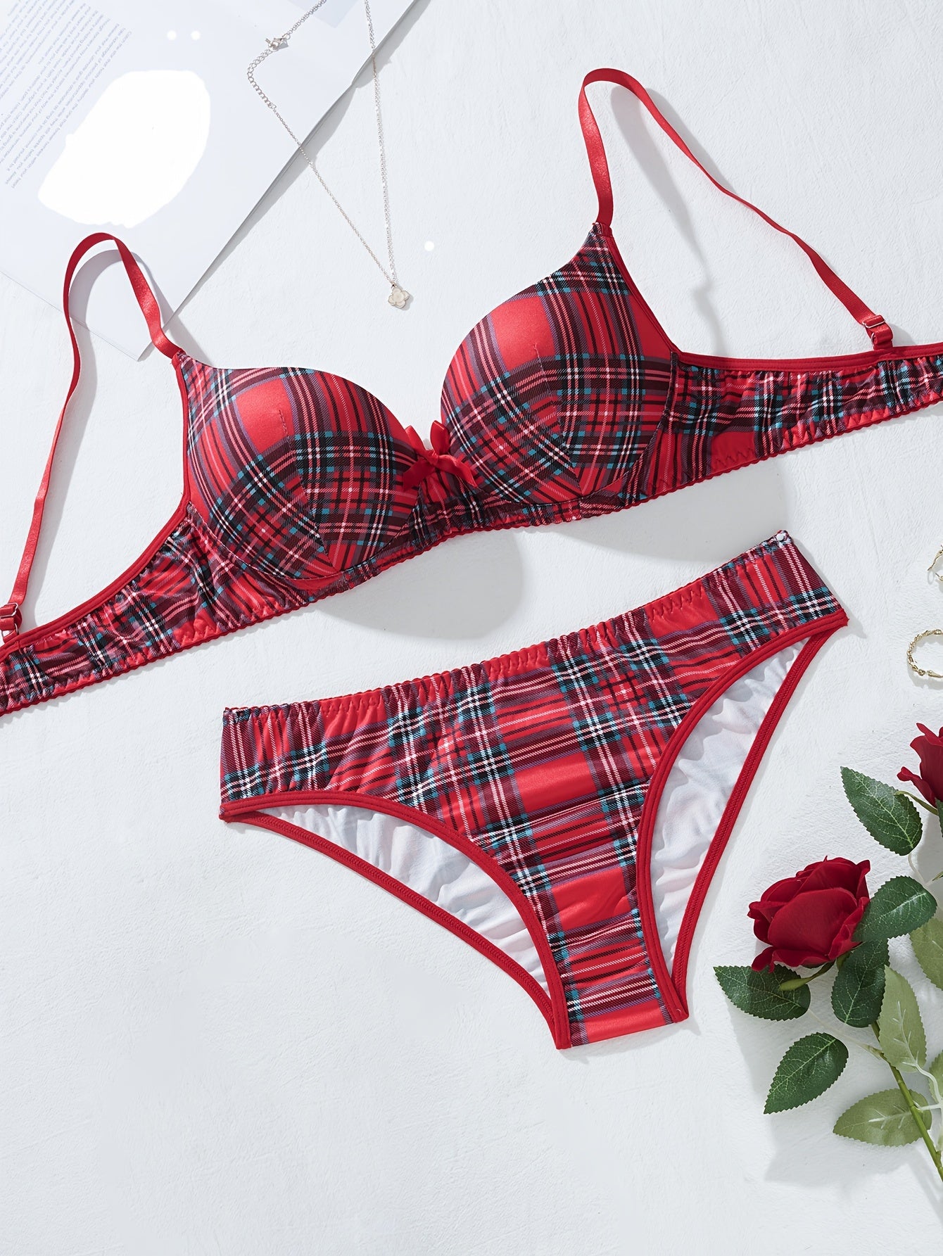 Plaid lingerie set for women made of 95% polyester and 5% elastane. Features medium support bra and mid-rise briefs in color block design. No chest pad included. Part of adult lingerie