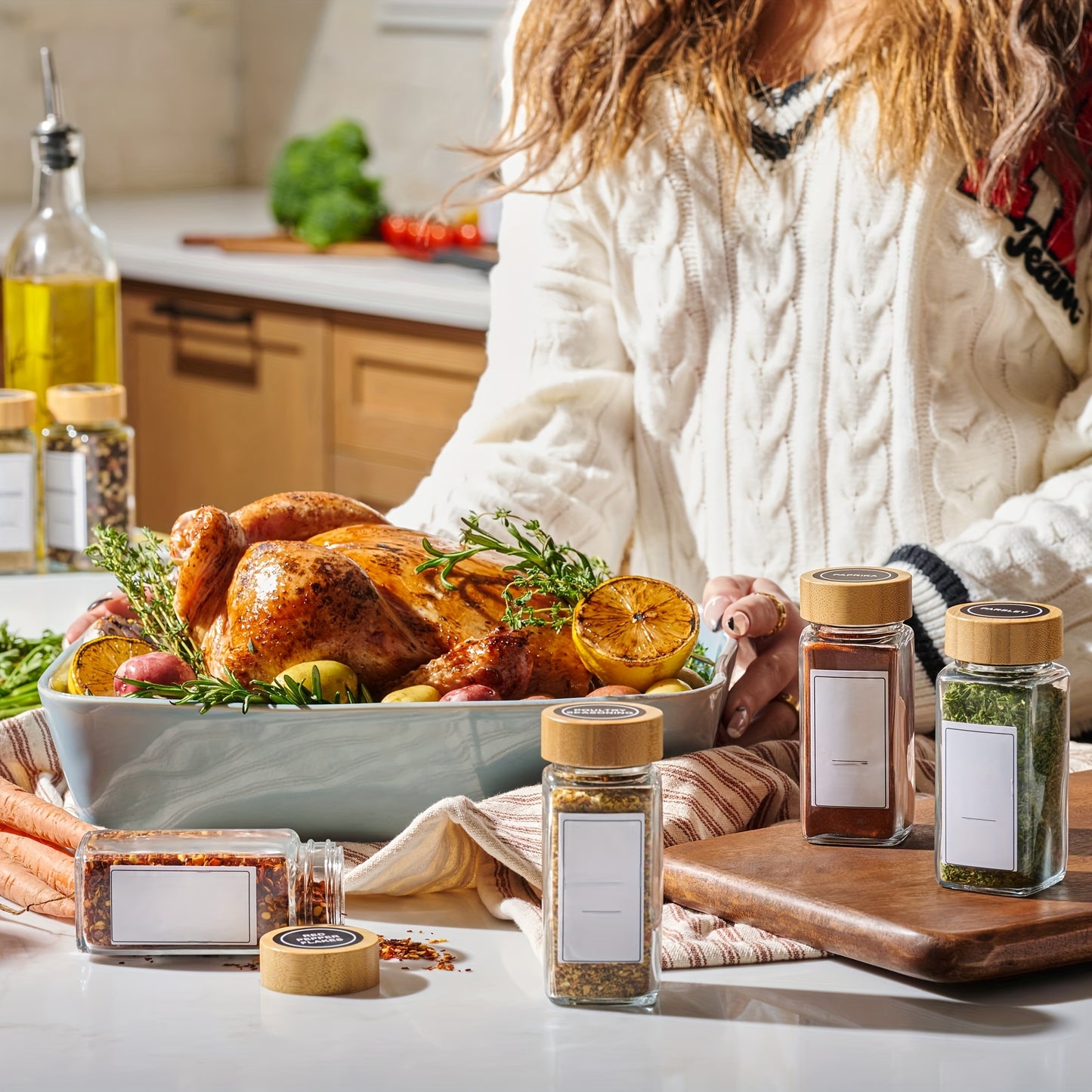 12-piece glass spice jar set with bamboo lids, labels, and funnel for airtight kitchen storage of seasonings and condiments.