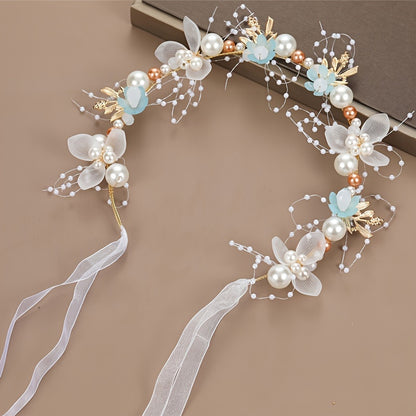 Elegant white plastic headband with floral design for girls, perfect for performances and vacations.