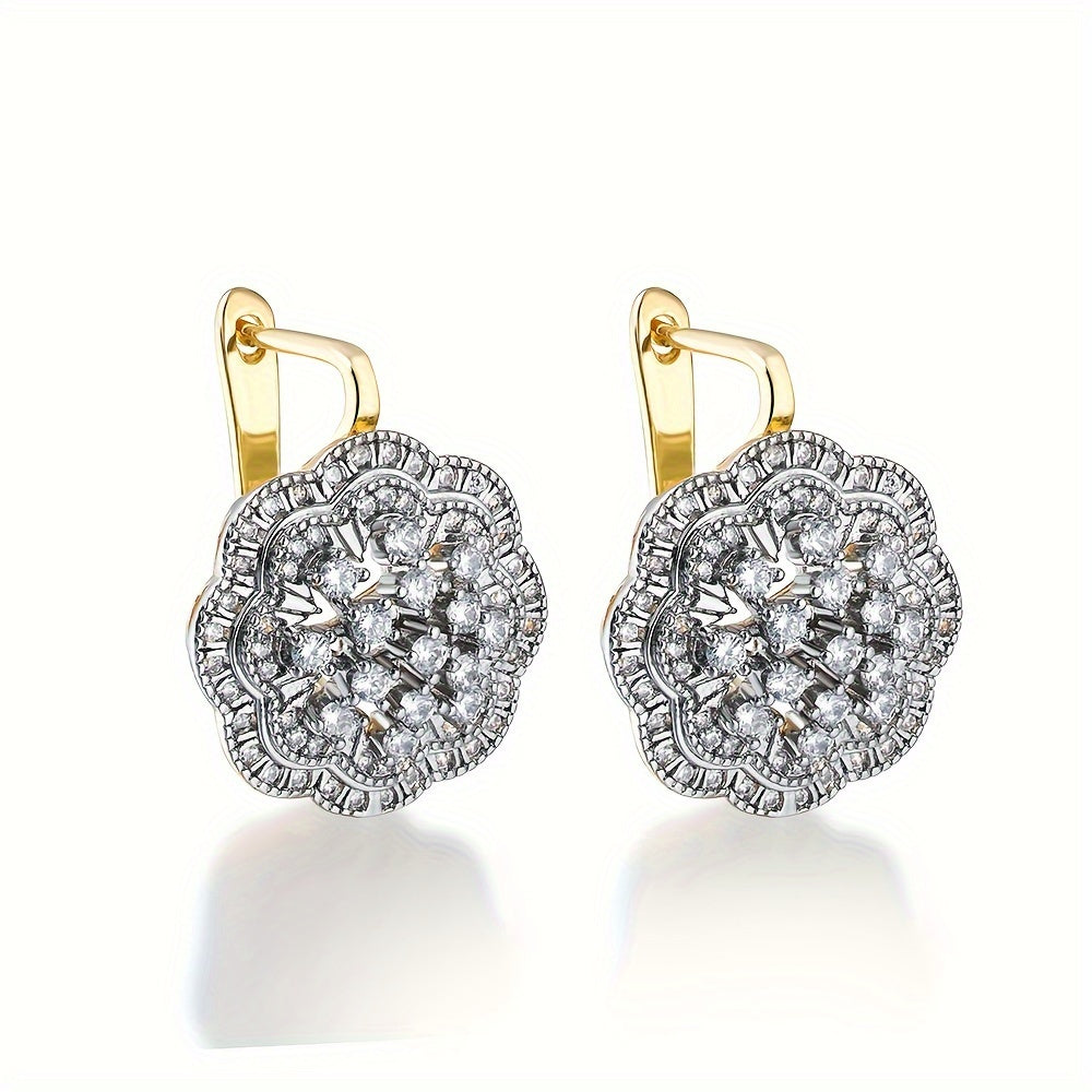 Stunning 18K Gold-Plated Copper Flower Earrings and Ring Set adorned with Synthetic Cubic Zirconia, Perfect for Women. Featuring a Luxurious and Elegant Dual-Tone Hollow Design, Ideal for Daily Wear or Wedding Events.