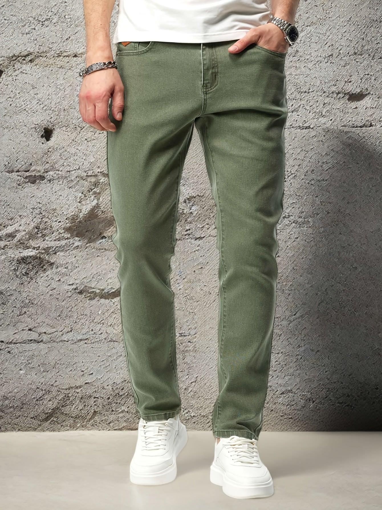 Stretchy denim jeans for men, ideal for casual outdoor wear.