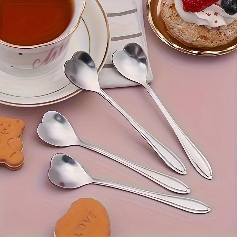 Celebrate love with 2 stainless steel coffee spoons shaped like hearts, the perfect gift for Valentine's Day. These creative spoons are perfect for stirring desserts and are ideal for Christmas parties, holidays, restaurants, and home use.