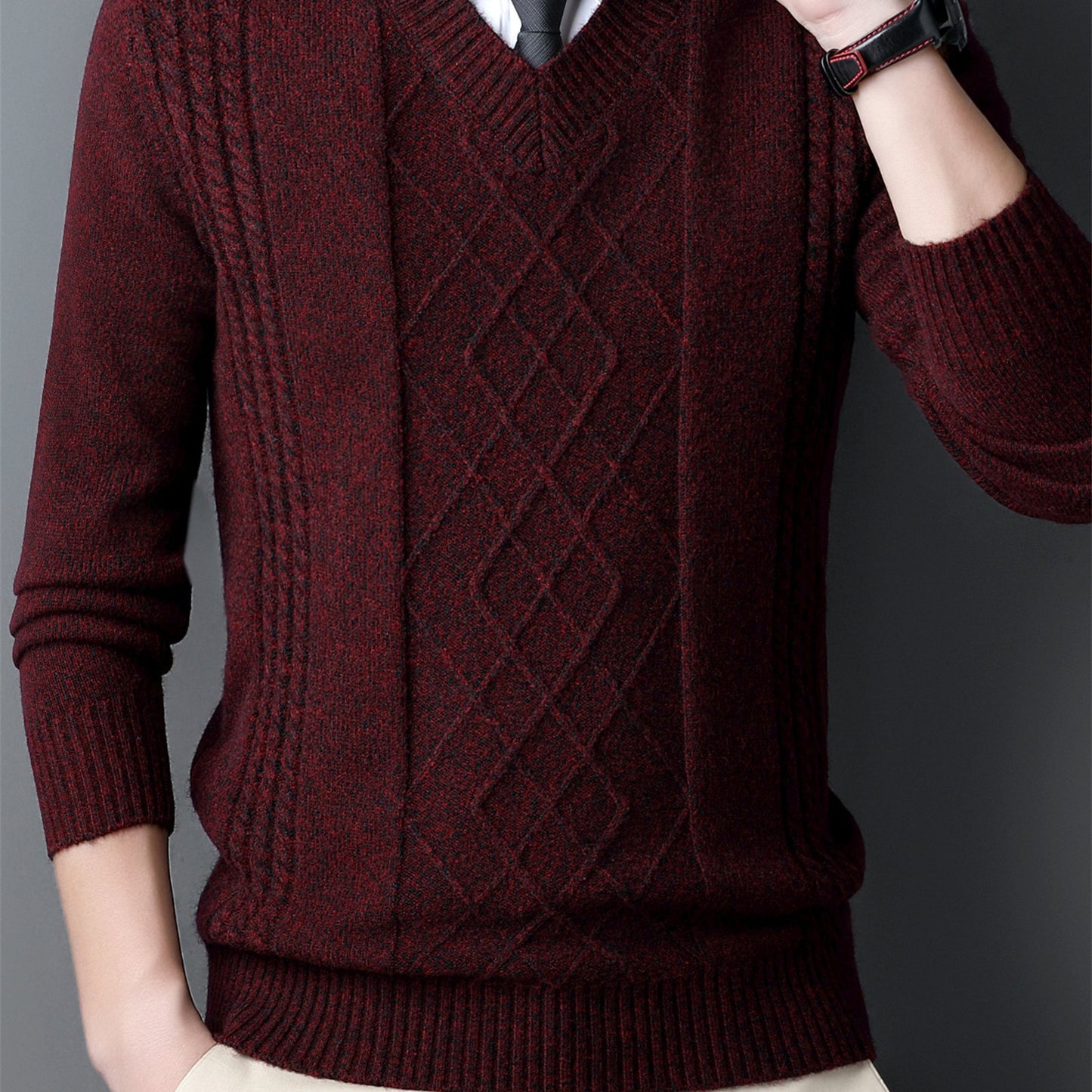 Men's red V-neck sweater with diamond pattern, long sleeves, ideal for fall and winter, can be layered for a formal look.