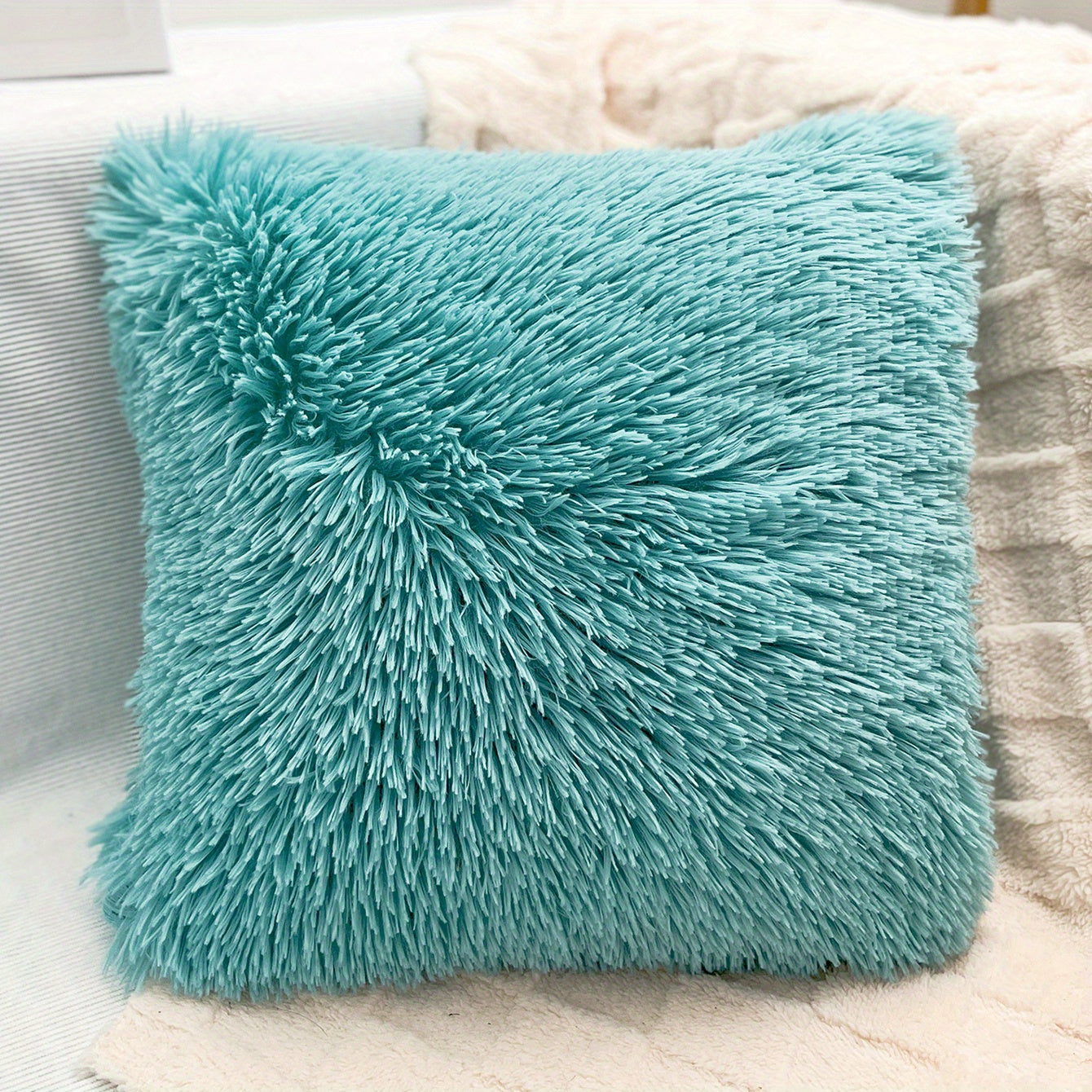 Bohemian-style plush throw pillow cover for sofa or bed in gray, white, and turquoise. Features zip closure, soft polyester material. Hand wash recommended.