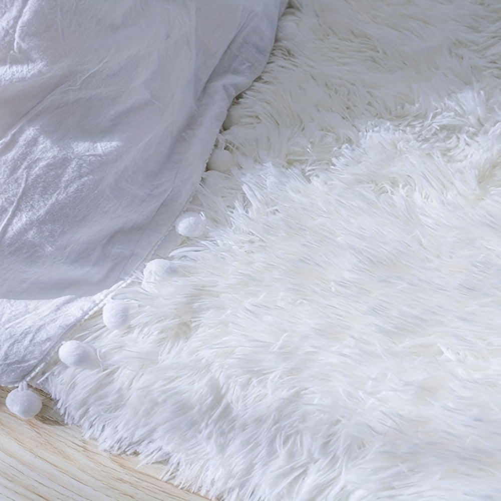 Soft and luxurious pure white plush area rug, ideal for bedroom, living room, and dorm décor. Made from machine washable polyester for easy care.