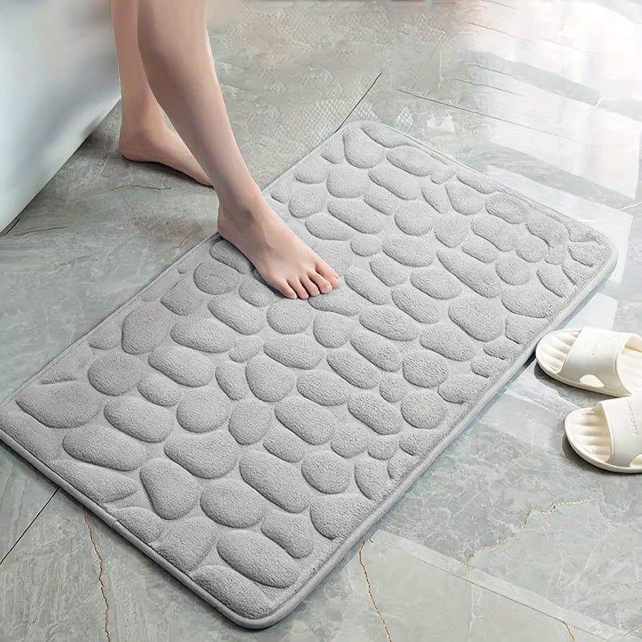 Ultra-absorbent bath mat with high-density memory foam, non-slip design, and super soft luxury feel, perfect for tubs and showers.