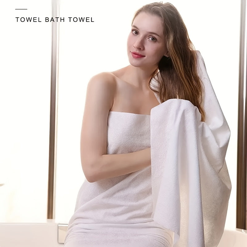 Extra-large 139.7x71.12 cm travel towel made of soft, absorbent, aseptic cotton with geometric design. Ideal for beach, shower, hiking, swimming, hotel, camping. White and portable for convenience.