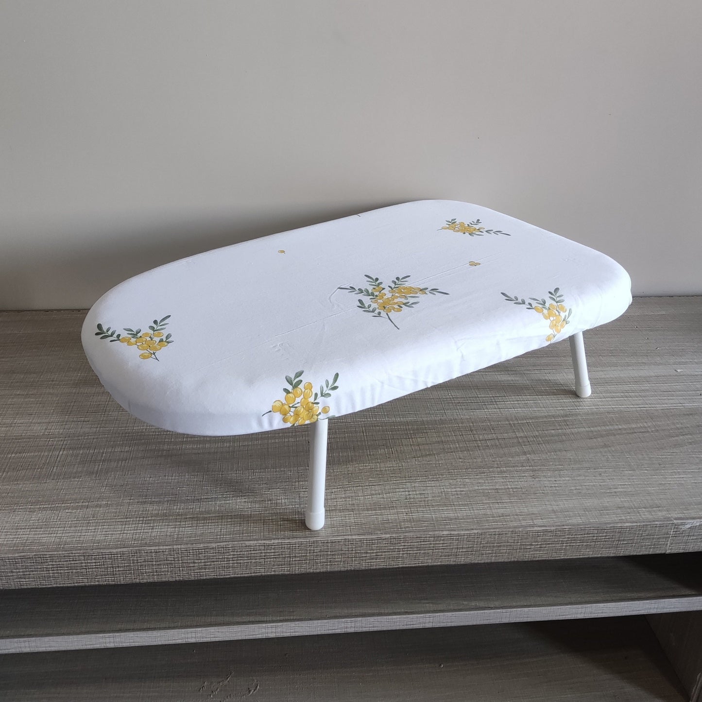 Compact Floral Design Ironing Board, Foldable Tabletop Clothes Pressing Pad, Sturdy Plastic Material, Secure Base, Convenient Space-Saving Option