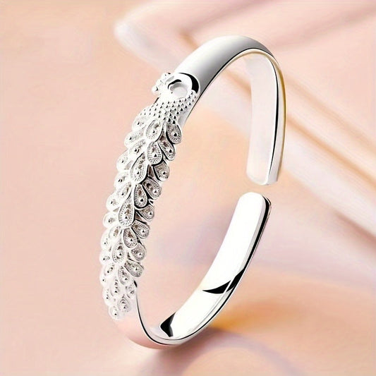 This elegant and versatile S999 sterling silver open bracelet is adjustable, fashionable, and simple in style. It is the perfect gift for your loved ones, including lovers, mothers, daughters, and for special occasions like parties, Valentine's Day, or