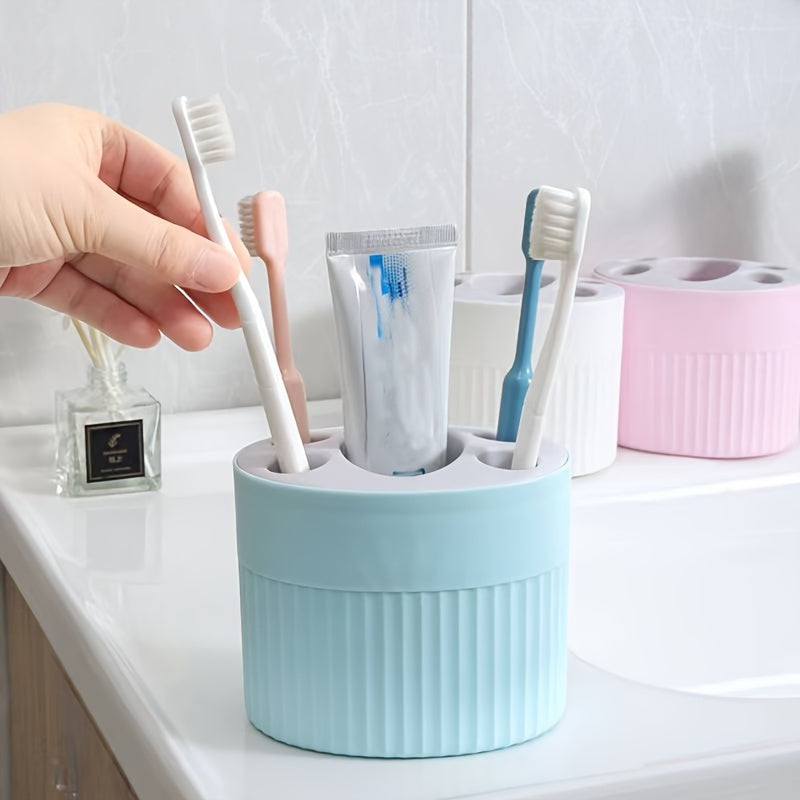 Toothbrush and toothpaste storage rack with detachable shelf for bathroom organization, easy to clean and convenient for makeup brush storage.