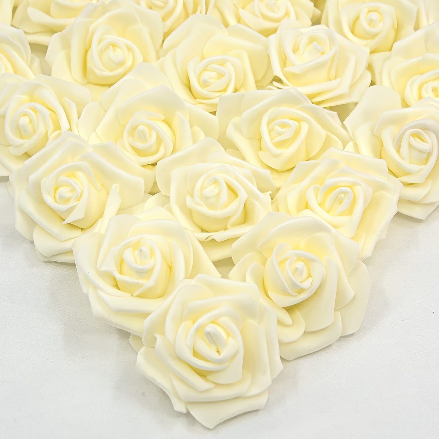 50 pack of luxurious PE foam artificial rose flower heads for various occasions - perfect for DIY crafts, weddings, and home décor throughout the year.